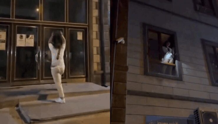 Caminin kapısını taşla kıran genç kadın, mahalleyi ayağa kaldırdı