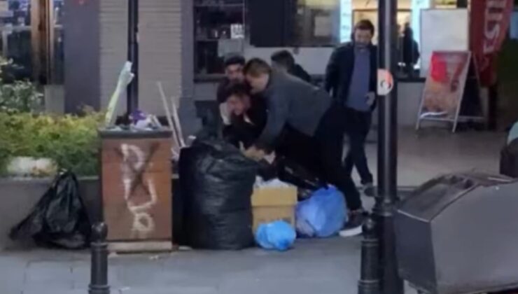 Çöpe attıkları adamı tekme tokat dövdüler