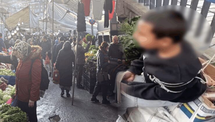 Pazarda çocuğu iple bağladı