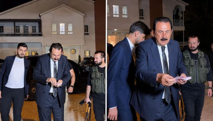 Ertoşi aşiretinin lideri İskender Ertuş aracından iner inmez deste deste para dağıttı